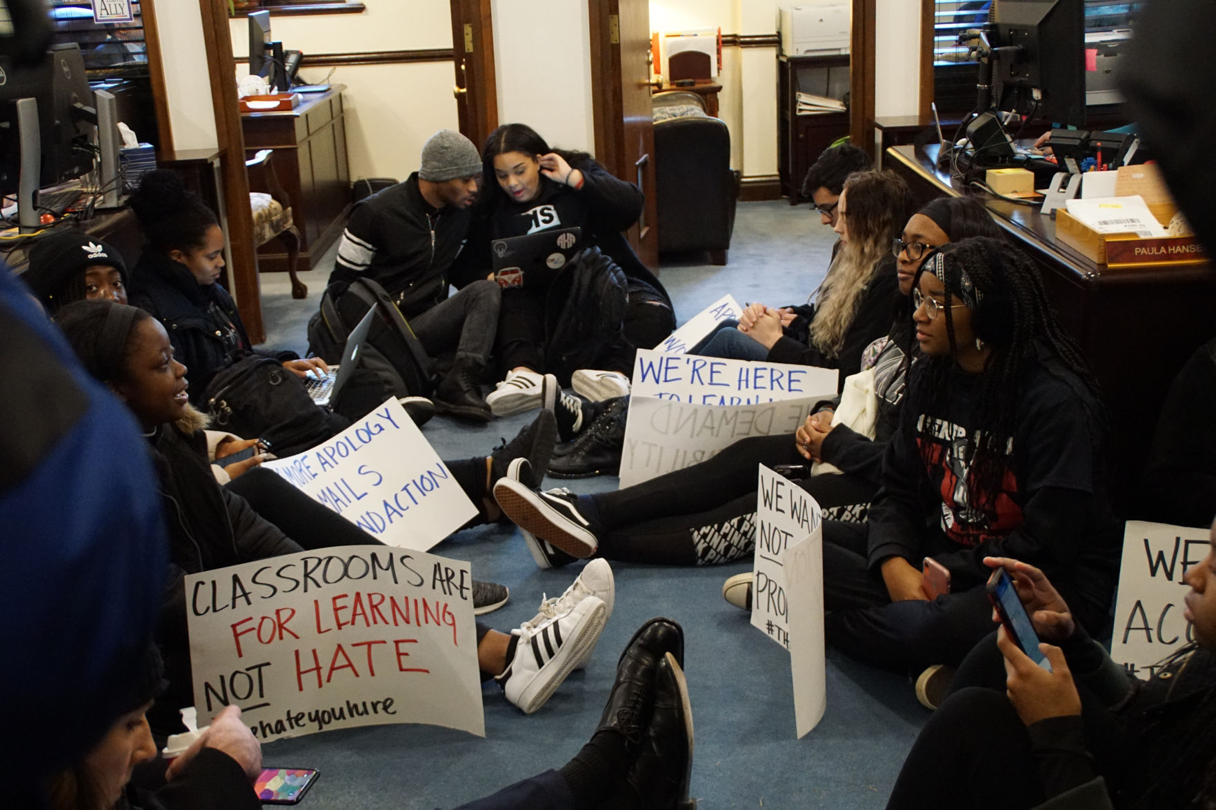Sit-in sign